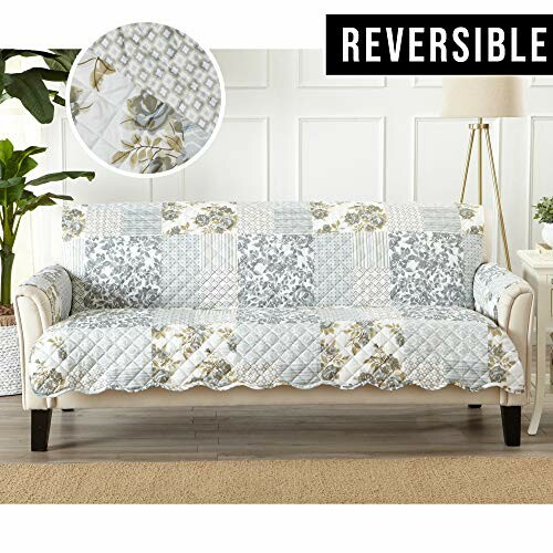 Reversible floral quilted sofa cover on a couch.