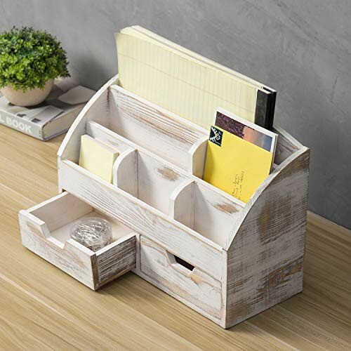 Wooden desk organizer with multiple compartments and drawers.